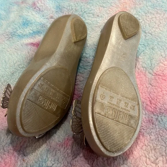 Gently used girls Mel by Melissa dress shoes. Size 12. Silver with butterflies. - Picture 2 of 3